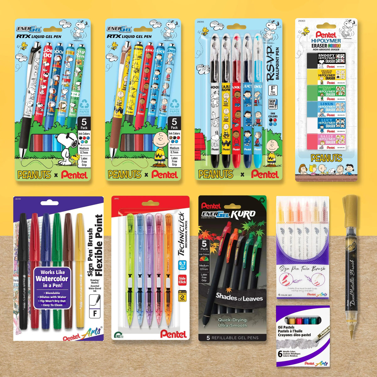 Assorted PEANUTS and Pentel writing supplies including Snoopy themed gel pens pencils markers erasers and colorful brush pens in retail packaging