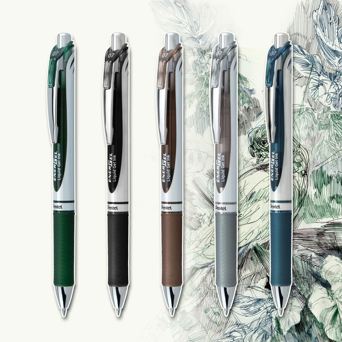 Five retractable pens in green black brown gray and blue arranged vertically over a detailed botanical sketch background