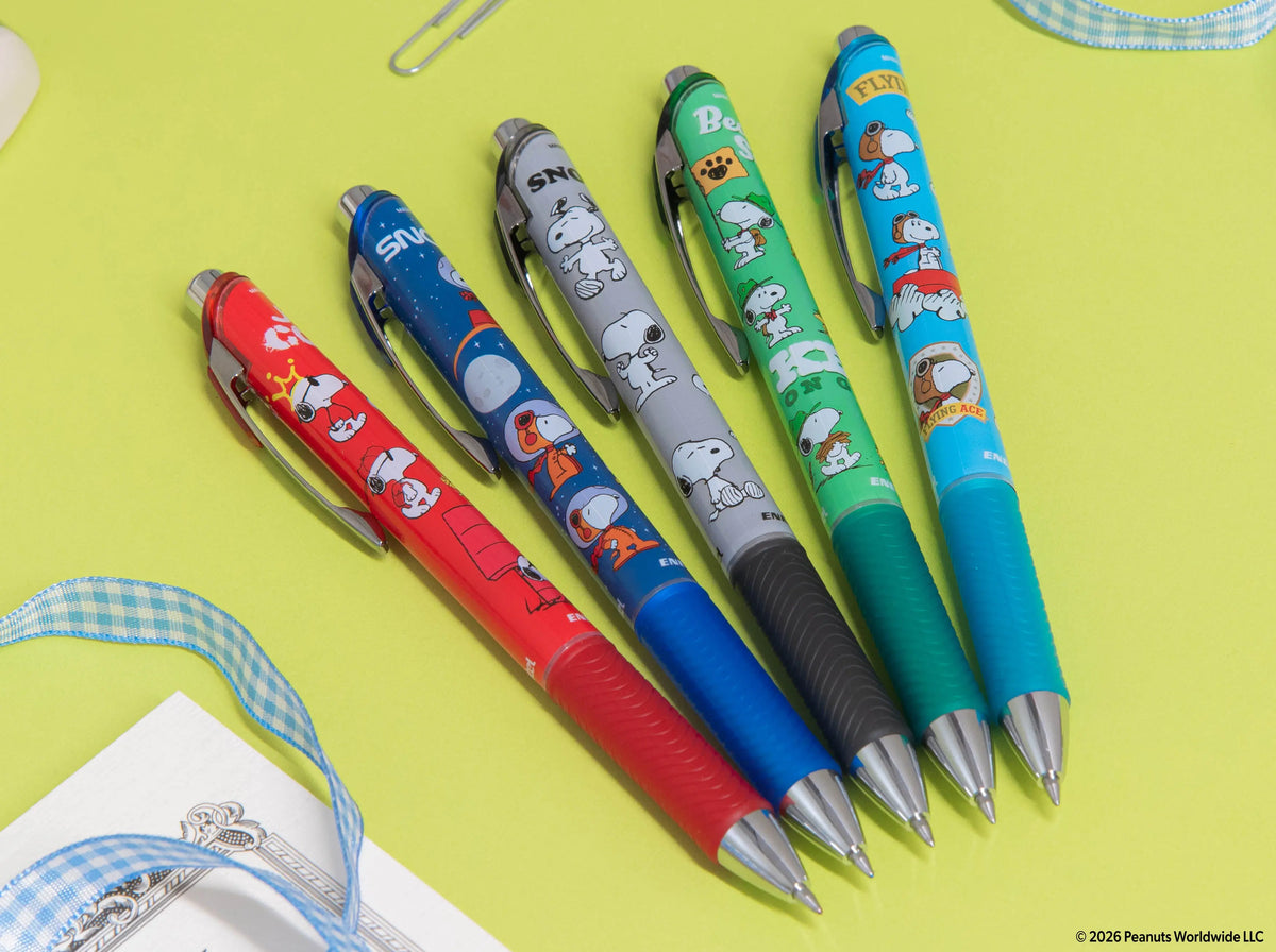Five colorful Pentel Snoopy gel pens with playful character barrels in red blue gray green and teal displayed together on a bright lime background