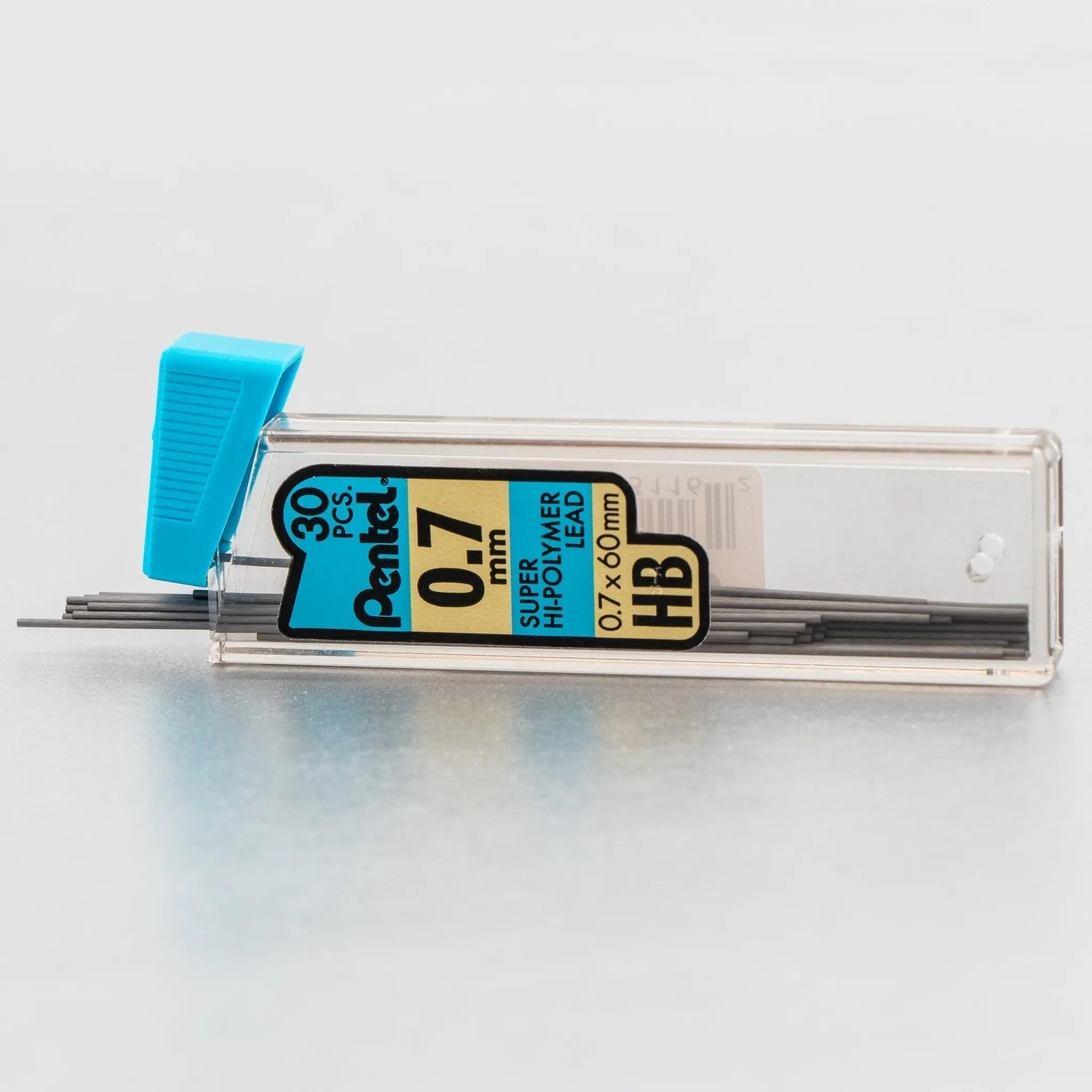 Clear plastic tube of Pentel mechanical pencil lead refills with blue cap, containing 0.7mm HB Super Hi-Polymer leads for smooth, precise writing and drawing.